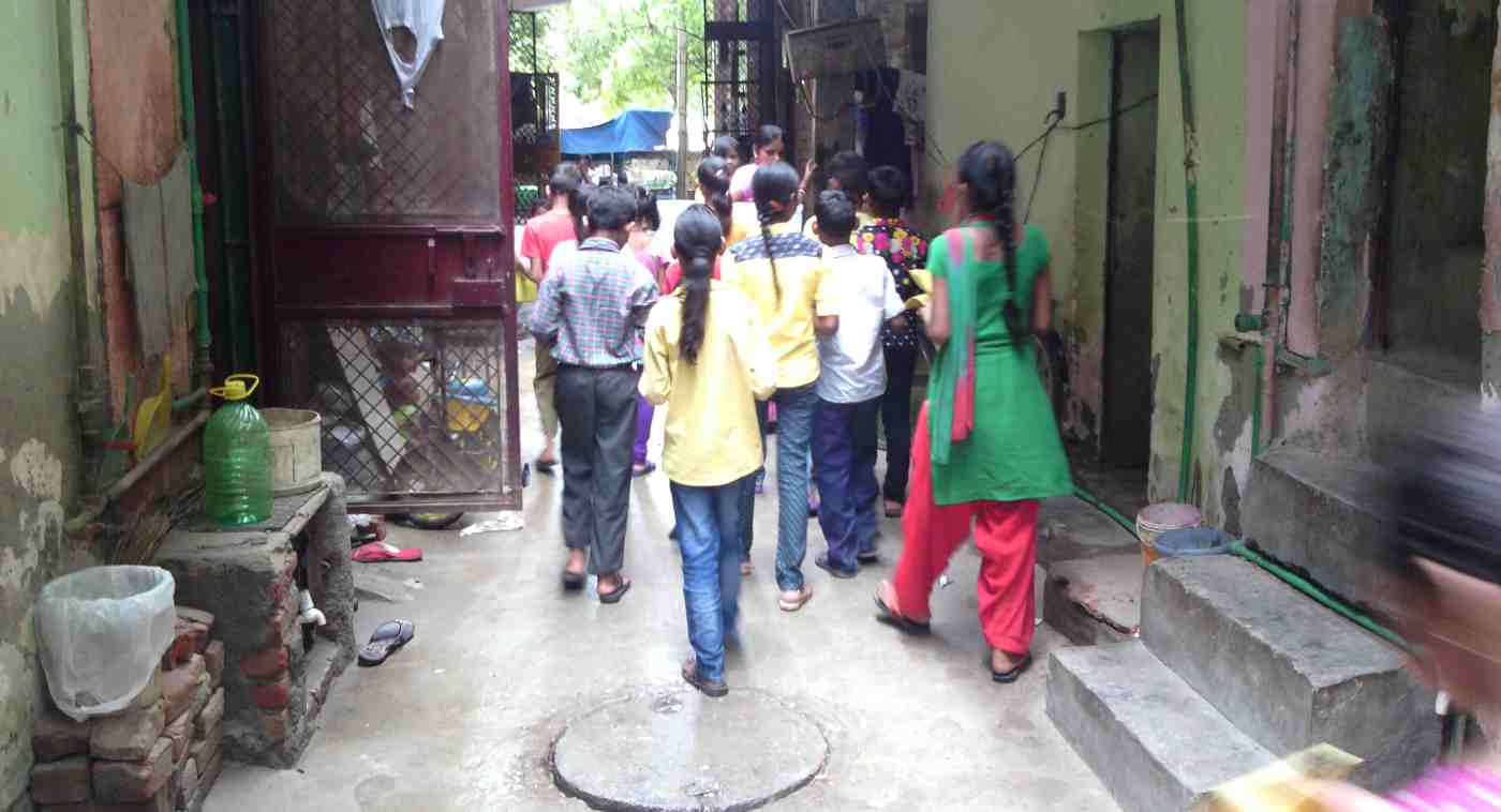 RMN Foundation School children meeting people in streets to explain the real meaning of education.