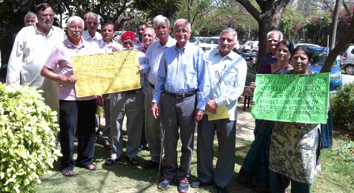 Senior citizens in a group housing society of Dwarka in New Delhi urge the government to save them from dust pollution, noise pollution, and air pollution of extended FAR construction activity. Photo and Campaign by Rakesh Raman [ Click the photo to know the details. ]