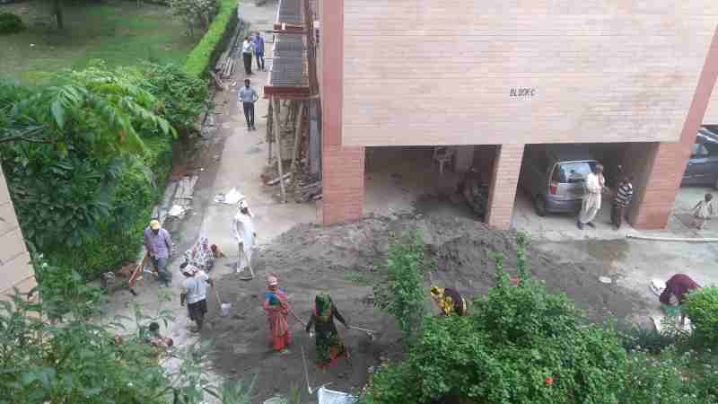 Deadly dust and noise pollution is caused by FAR construction in occupied cooperative group housing societies of Delhi where millions of people live.