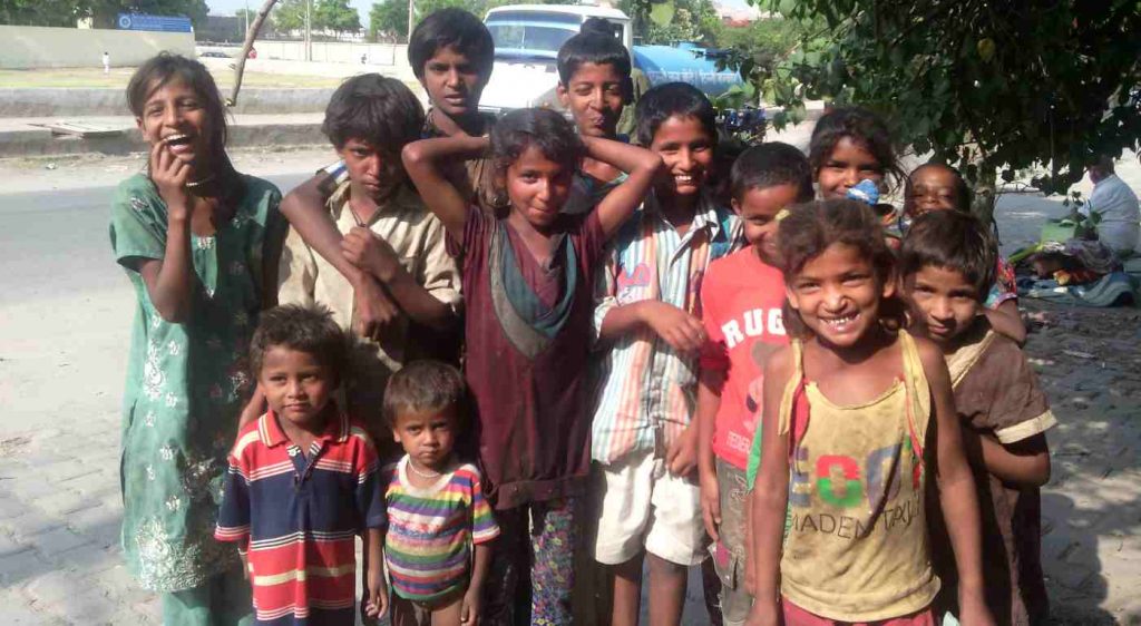 Poor children who live and sleep on the open pavements in India’s capital New Delhi. Photo: Rakesh Raman / RMN News Service