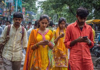Representational AI-generated image of mobile phone users in India. Photo: RMN News Service