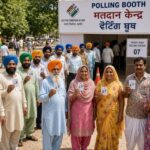 Punjab voters standing in a queue at a local polling booth during the state assembly elections.